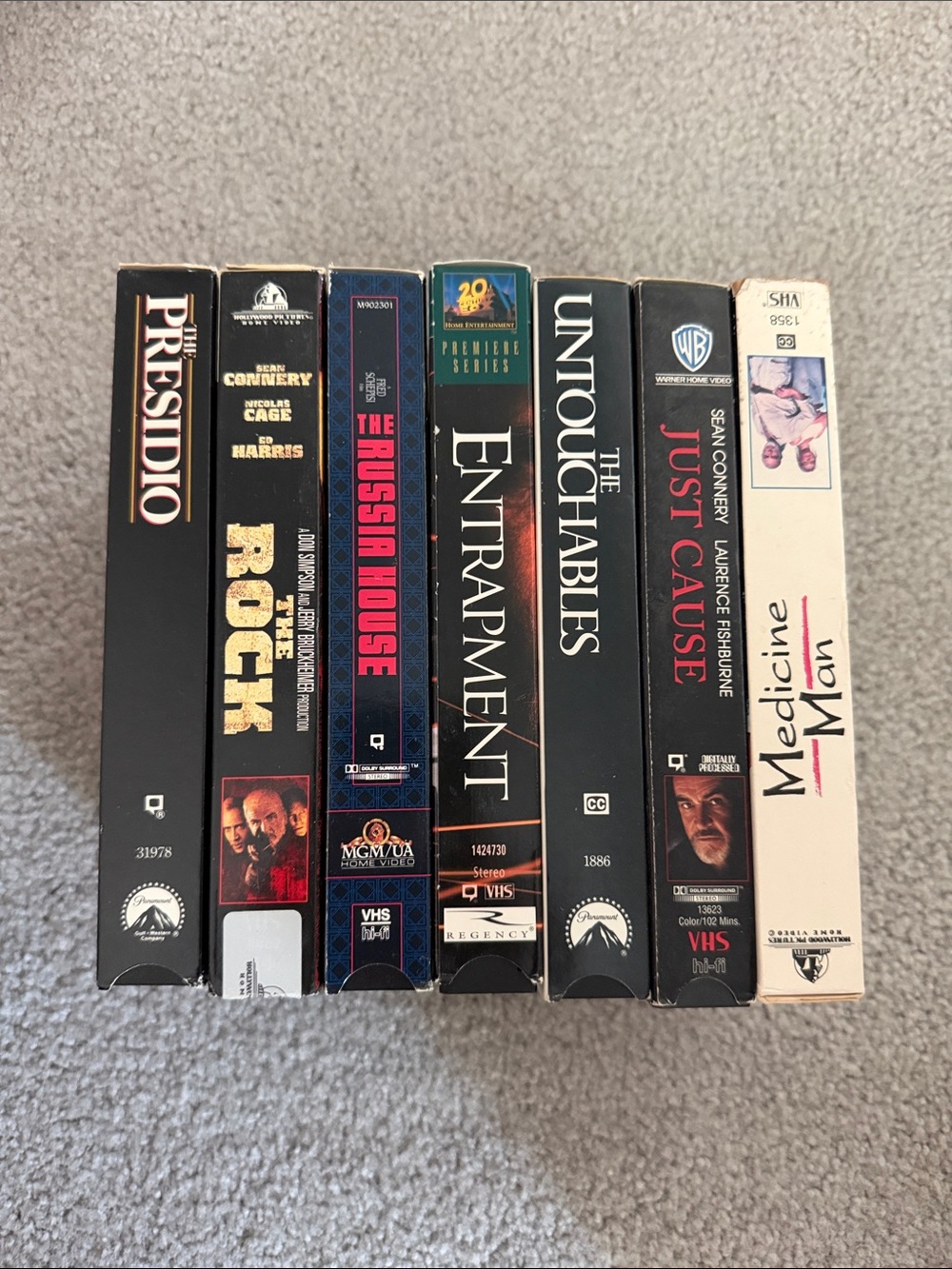 vintage VHS tapes featuring films starring actor Sean Connery,